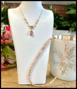 Necklaces featuring peachy and pink gemstones such as morganite, Padparadscha sapphire, imperial topaz, pink tourmaline and pink opal.
